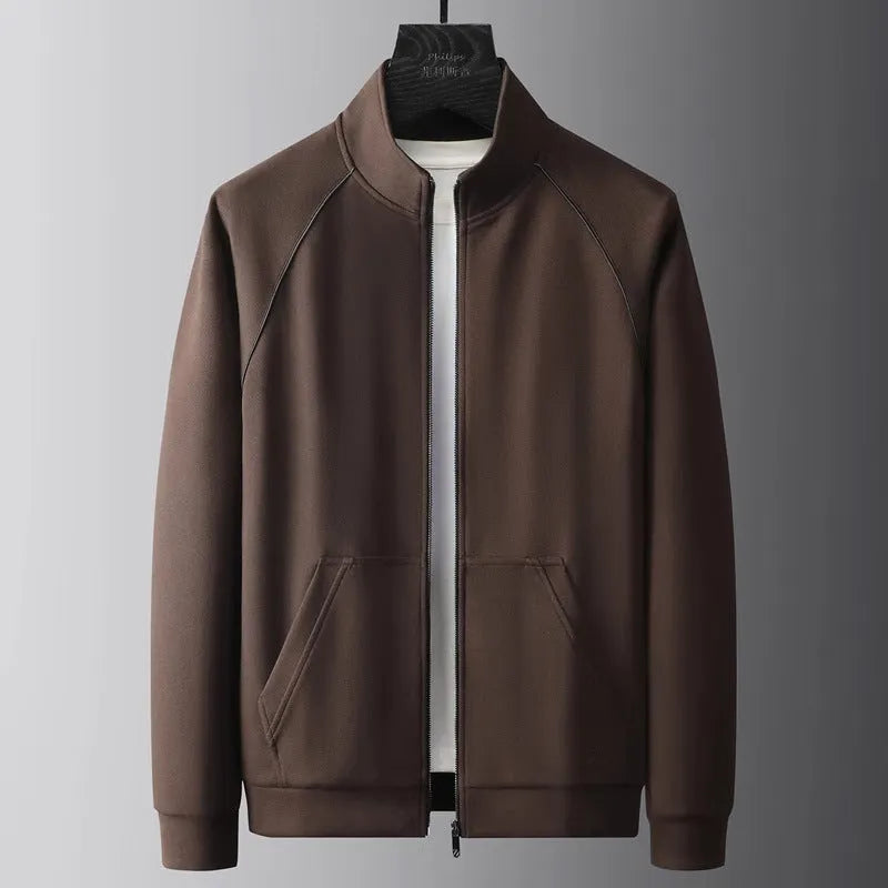 Stand collar casual sports suit comprising a coat and trousers in a slim fit, shown in coffee colour.