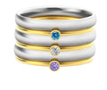 A geometric engraved titanium steel ring with a December birthstone, shown in UK ring sizes.