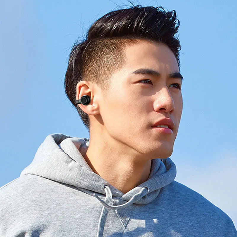 Wireless clip-on Bluetooth earphones with bone conduction technology in black or white colour