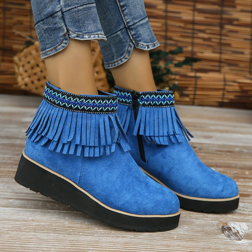 Women's black suede wedge ankle boots with a thick platform sole and side zipper.