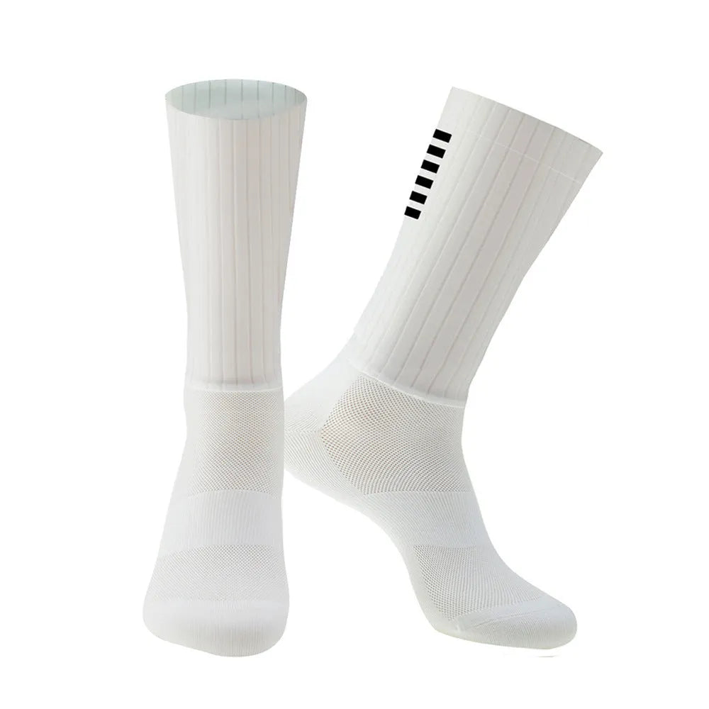Athletic sports socks for cycling and running in six colour options including orange, black, and purple.