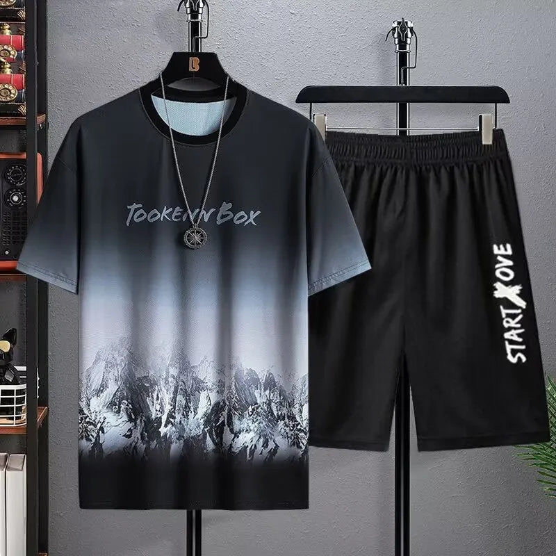 Men's thin polyester summer tracksuit set with short sleeve top and shorts in a casual colour.