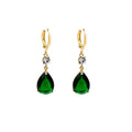 A pair of green geometric teardrop alloy earrings on a plain background.