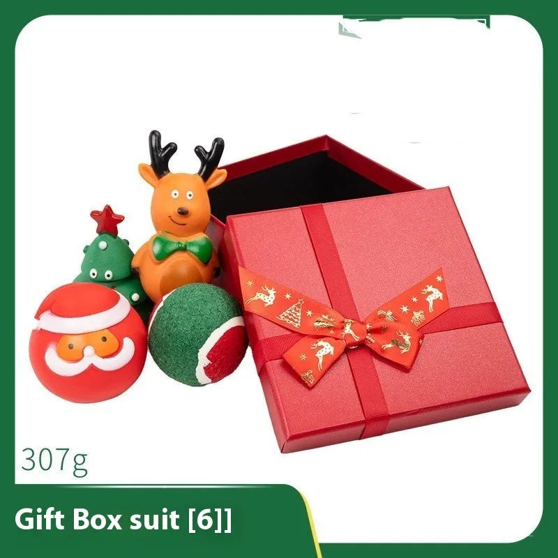 Christmas dog chew toys set with vinyl Santa heads, trees, and festive shapes in gift packaging