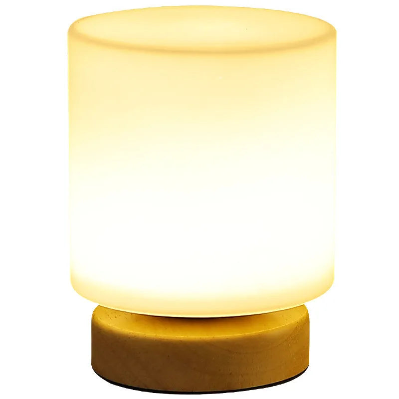 Nordic solid wood USB table lamp with touch dimming in white cube style on wooden surface