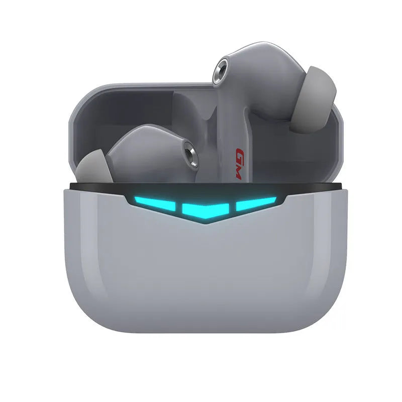 True wireless gaming earbuds in charging case with spare silicone tips.