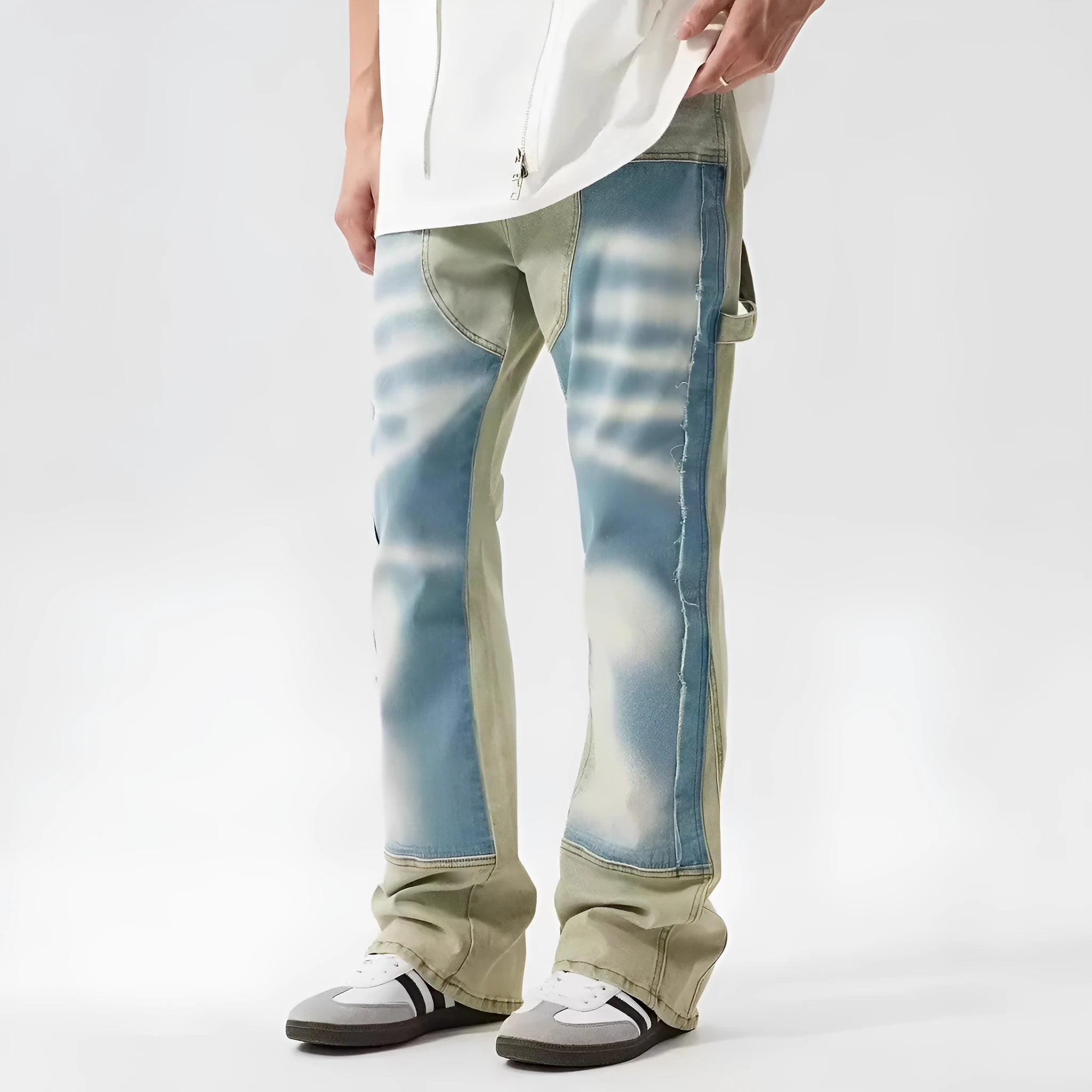 Retro yellow and blue patchwork jeans with splash-ink distressing, mid-waist cut with zip fly
