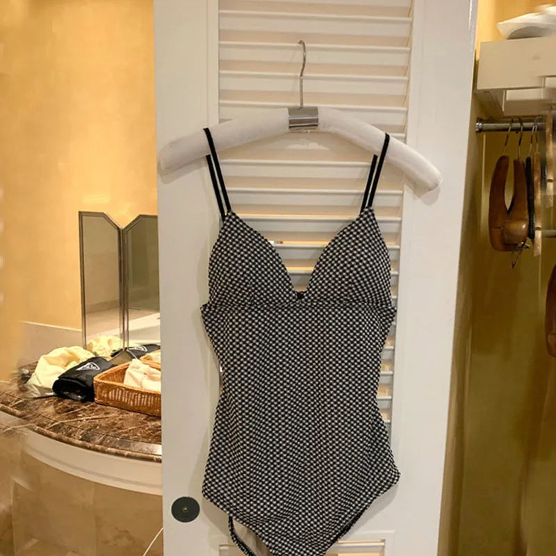Blue one-piece swimsuit with belly coverage design for hot spring swimming