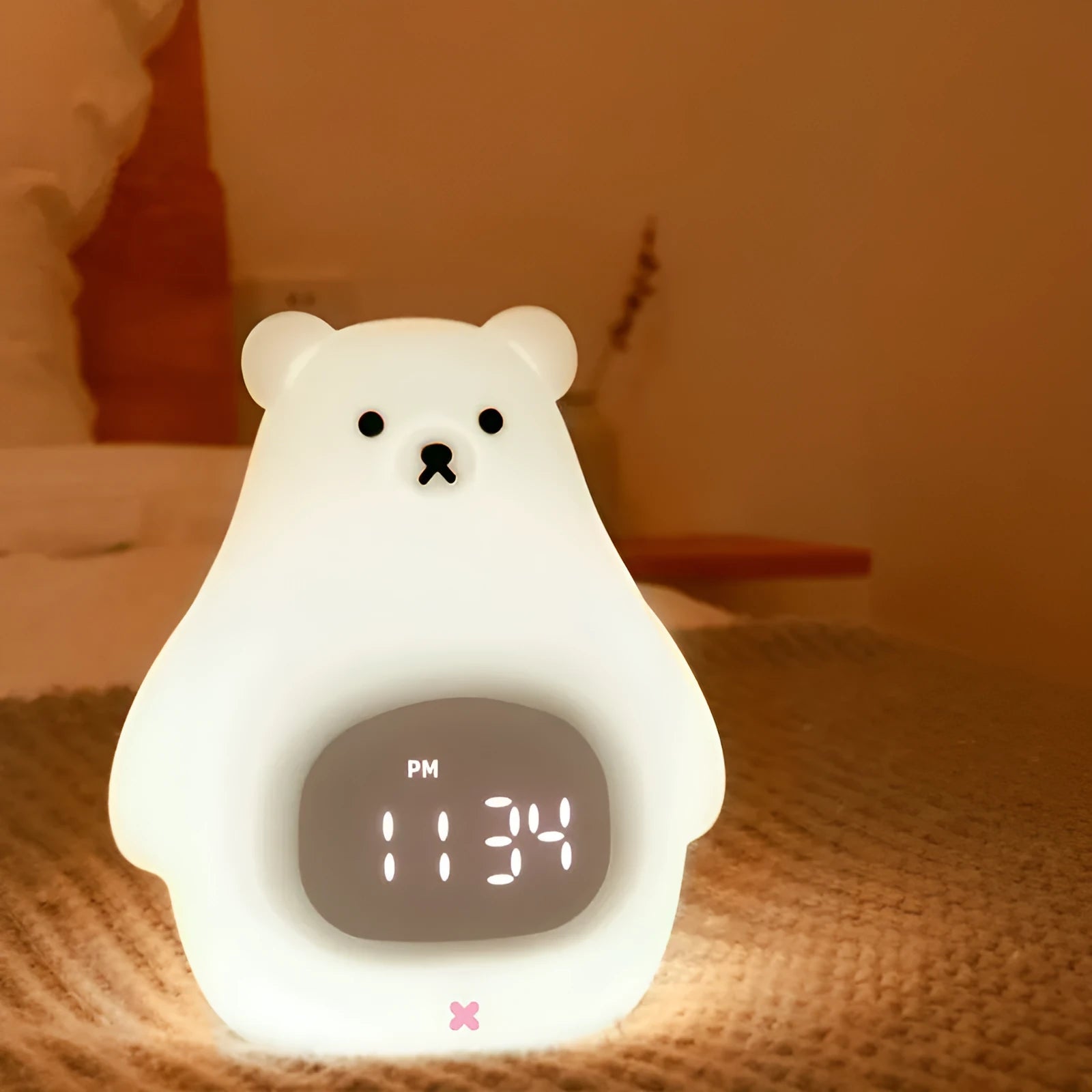 Big White Bear shaped silicone night light with a sleep timer and remote control on a surface.