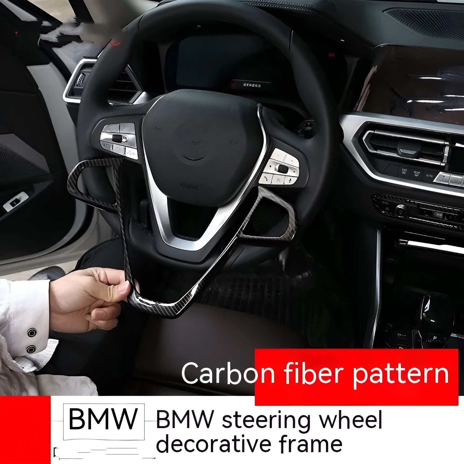 BMW steering wheel button frame decoration with black carbon fibre pattern finish.