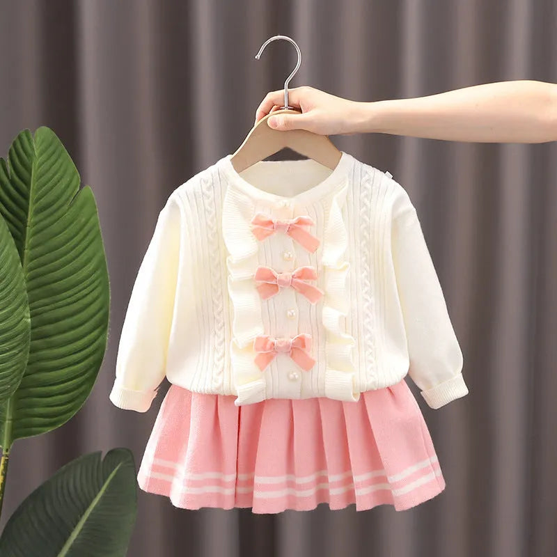 Knitted two-piece baby girl skirt suit with long-sleeve bow top and skirt in red, black or pink, sizes 80cm to 130cm