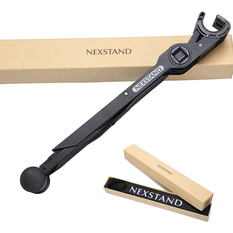 Black folding portable laptop stand showing folded dimensions of 35.4cm wide