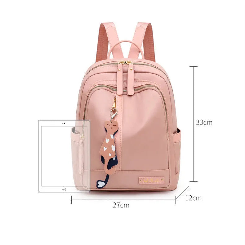 Women's black casual nylon backpack with multiple pockets and soft shoulder straps