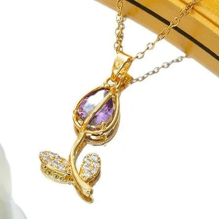 Zircon tulip necklace for women in gold colour on adjustable O-ring chain, showing floral pendant shape.