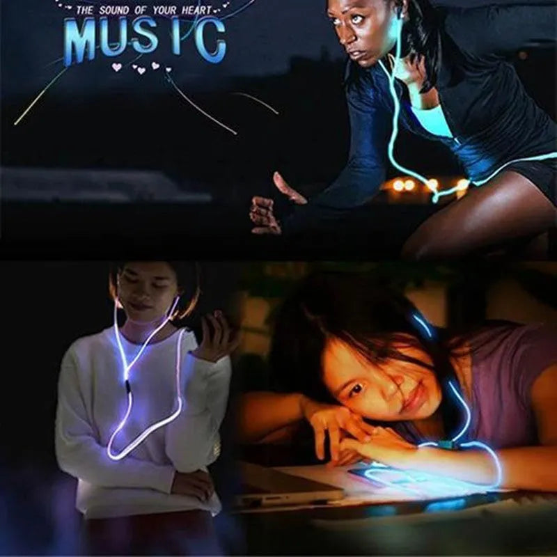 Close-up of blue LED earphones with aluminium alloy shells lit up, showing 3.5mm plug and inline remote.