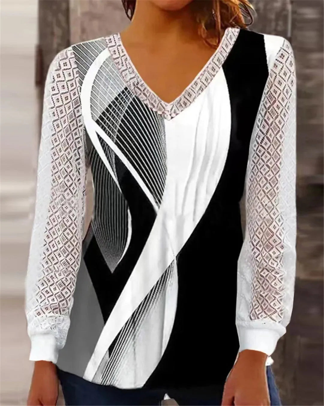 Women's V-neck lace top with hollow-out detailing in trueran polyester fabric