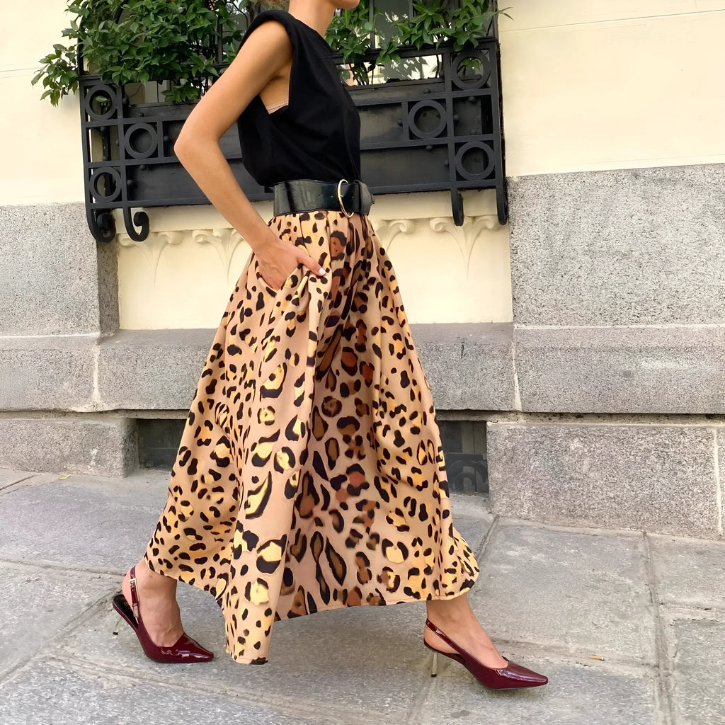 Brown leopard print women's A-line skirt with a long length and big flowing hem.