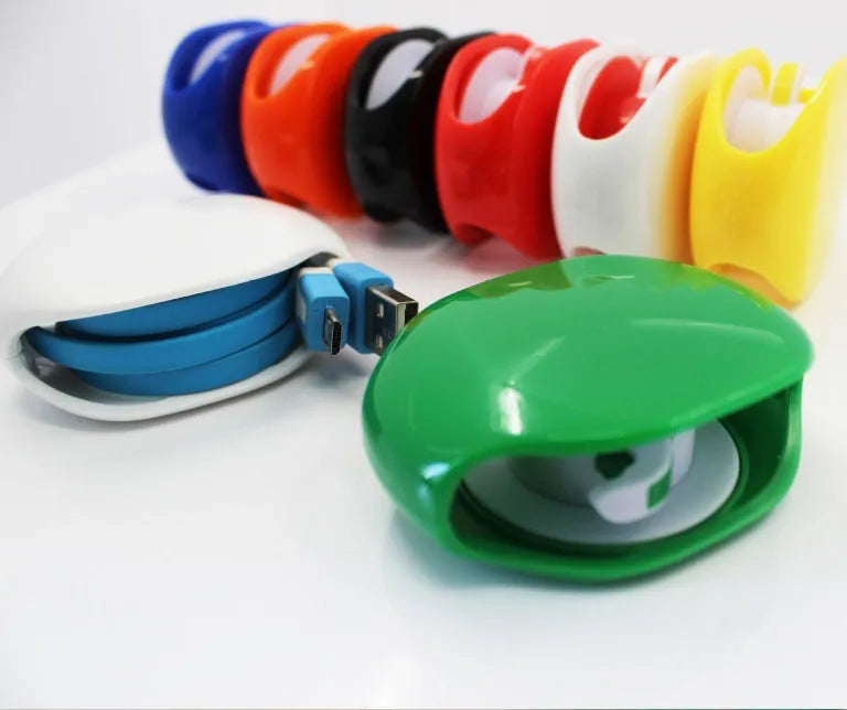 Automatic earphone cable winder retractor in PC ABS plastic, showing compact size and multiple colour options.