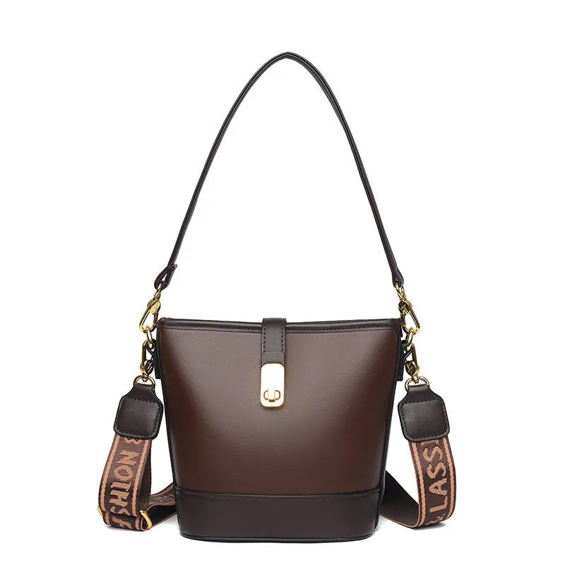 Black PU leather bucket bag with double shoulder straps showing internal compartments and external pocket