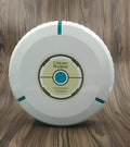 Black and white AC robot vacuum cleaner on wooden floor