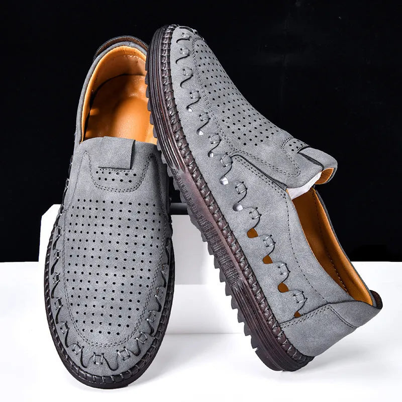 Men's brown slip-on casual shoes with a round toe and flat heel