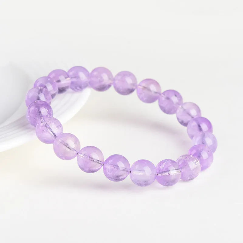 Lavender amethyst geometric water ripple bracelet with round beads on wrist
