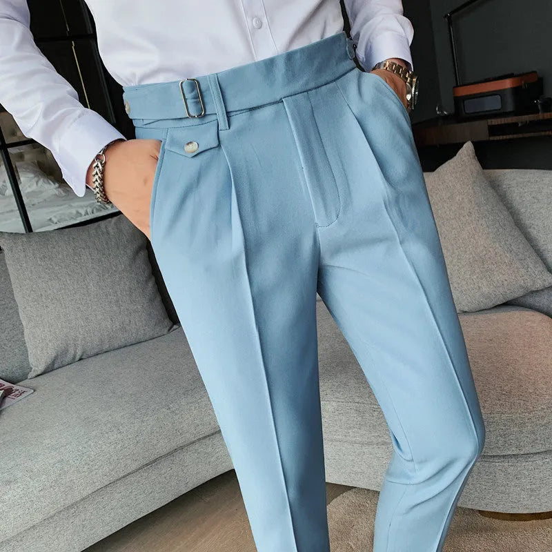 Men's straight-leg casual trousers in solid colours like black, grey, and khaki.