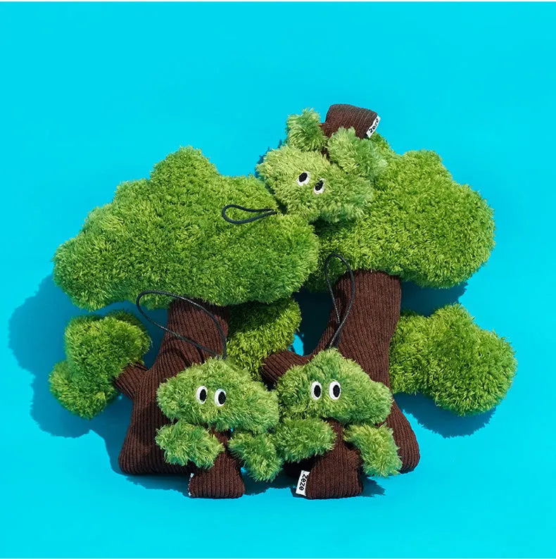 Pine tree-shaped hanging cat chew toy with mint filling, shown next to a ruler for scale