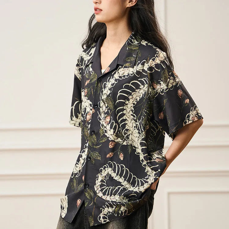 Short sleeve Cuban collar shirt with snake bone and floral pattern print in a loose fit.