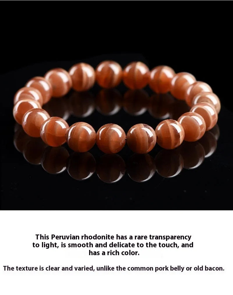 Natural old mine rhodochrosite round bead bracelet with ruyi elements, available in 6mm or 8mm bead sizes.
