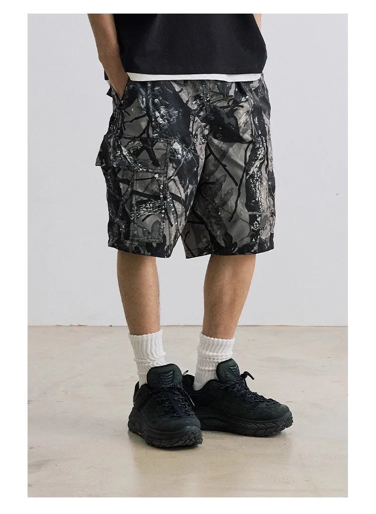 Loose casual straight-leg denim shorts in black colour with mid-waist design and zip fly placket
