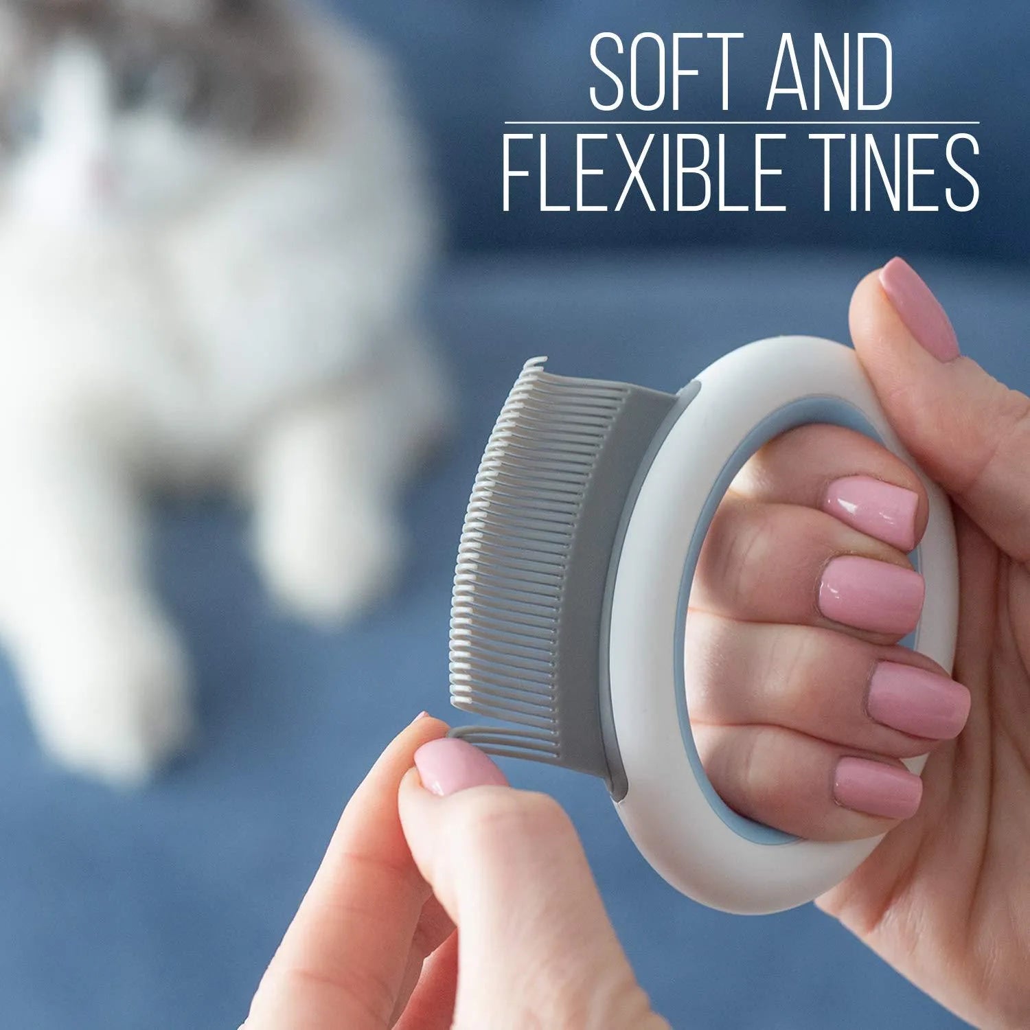 Blue pet grooming comb for cats and dogs on a white background