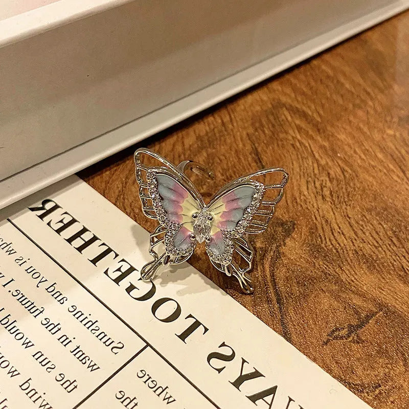 Butterfly women's copper ring with adjustable split ring design showing oil-drip colour treatment