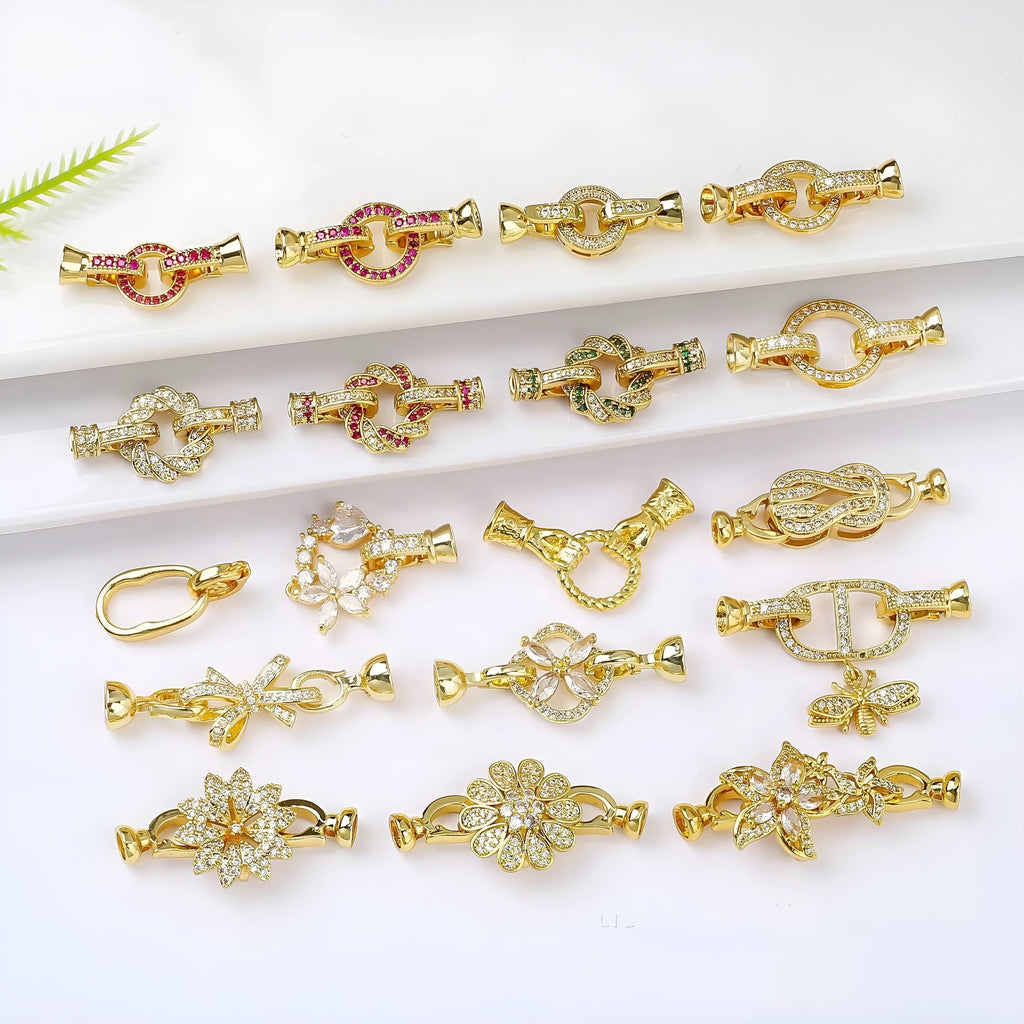 Small gold-coloured jewellery clasp with pearl detail for DIY necklace making