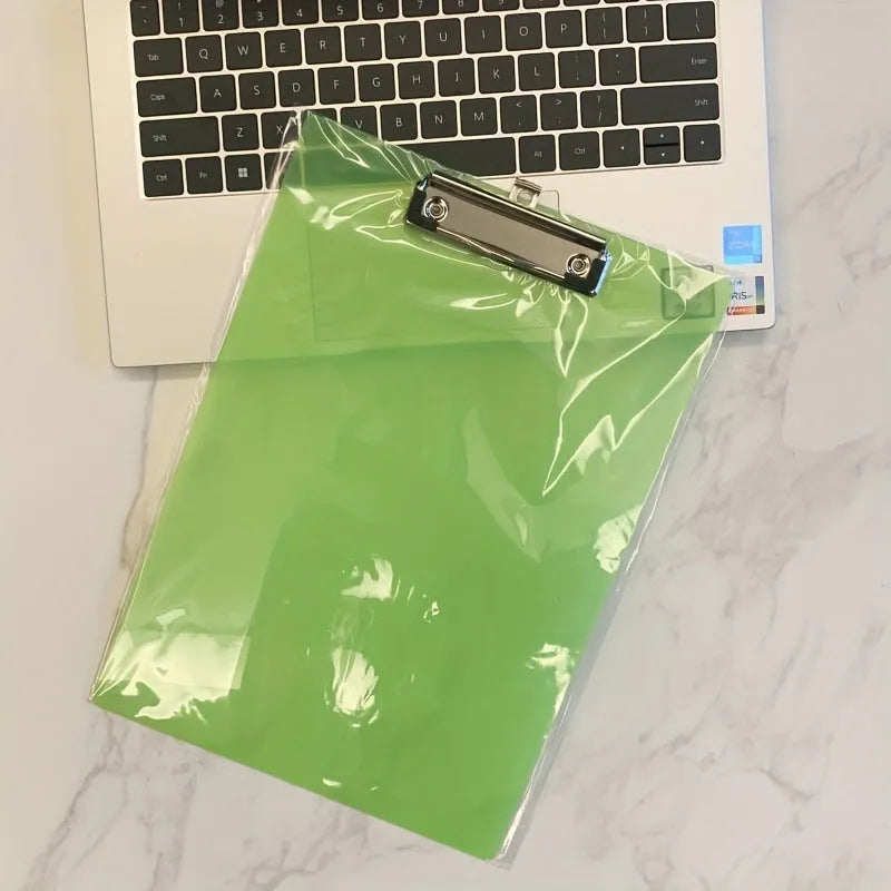 A4 transparent plate holder with metal clip holding documents in office setting