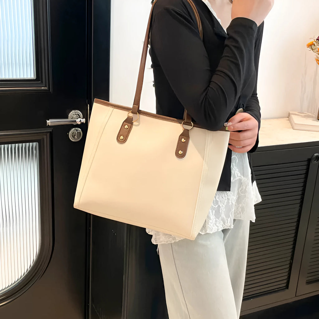 Korean style horizontal square shoulder underarm bag in PU material with a sandwich pocket.