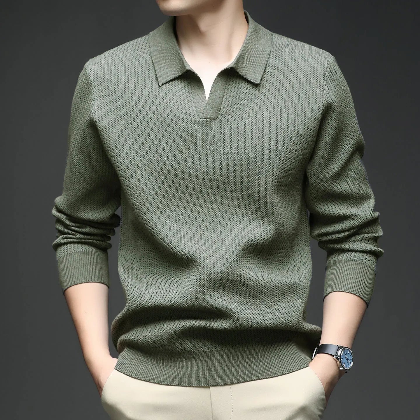 Men's loose fit casual pullover sweater in green, shown on a model.