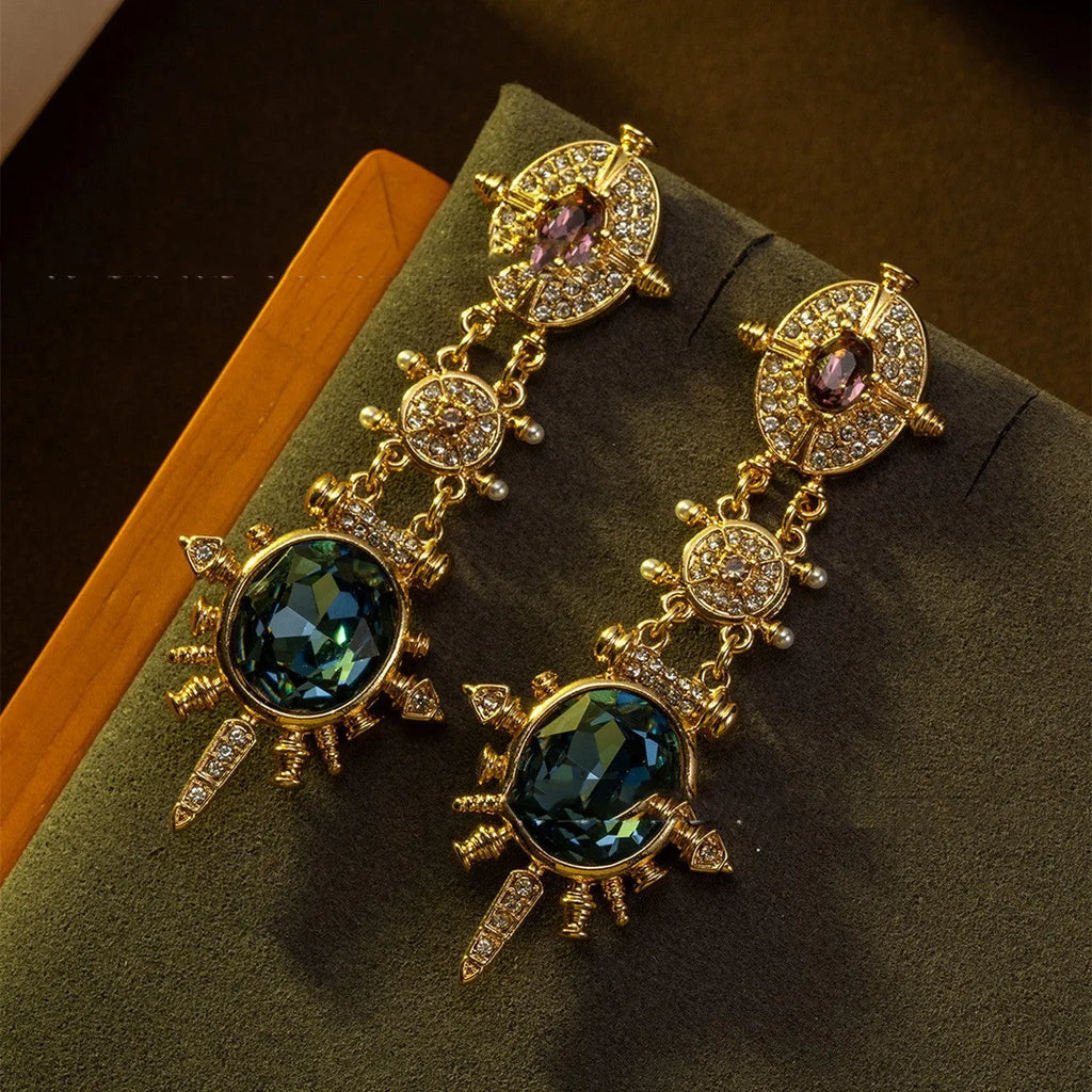 Geometric round gold-coloured stud earrings with diamond-treated alloy surface and retro elegant design