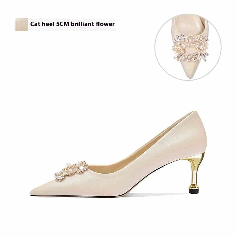 Rhinestone decorated women's high heel pumps in pointed toe style with cat heel or stiletto options.