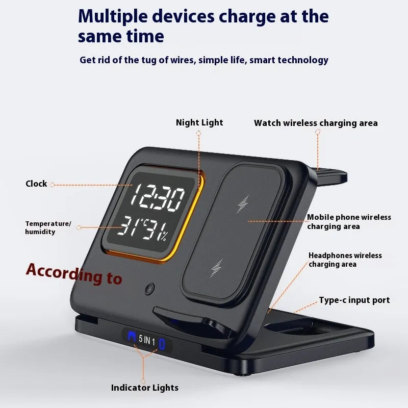 Black foldable wireless charging station displaying time and temperature, charging a phone and smartwatch.
