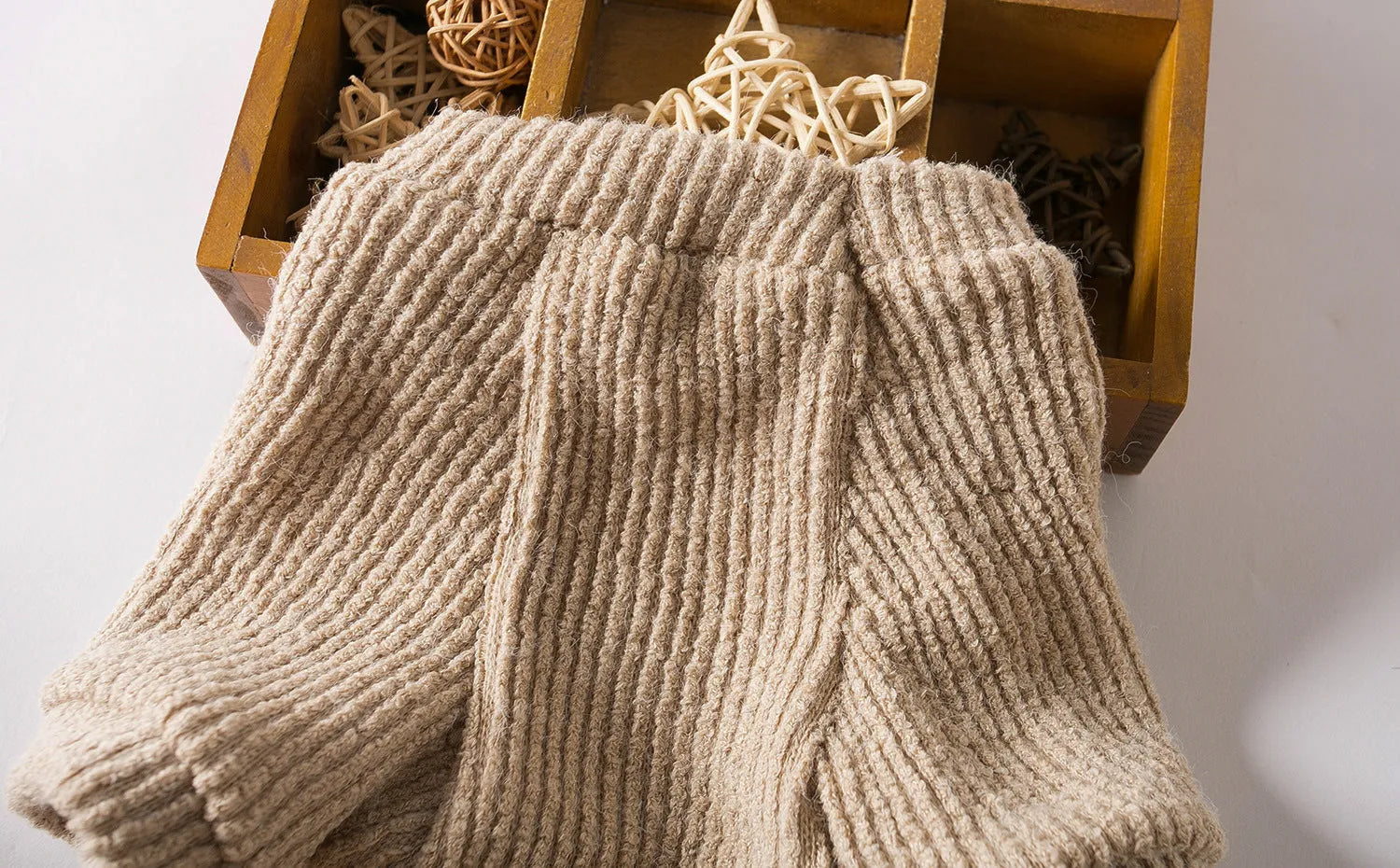 Brown knit sweater pullover for small breed dogs on a white background