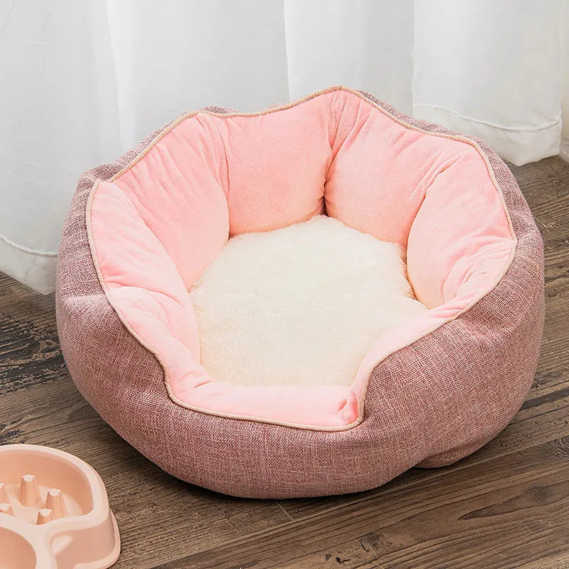 Blue octagonal pet bed for small dog with high sides and removable interior mat.
