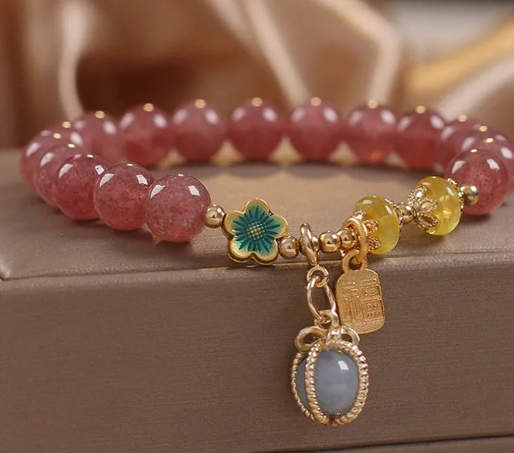 Red women's bracelet with strawberry quartz beads, alloy components, and rhinestones