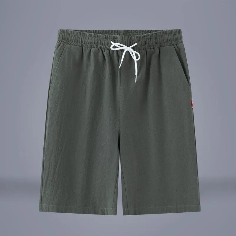 Casual cropped trousers in cotton-linen fabric with a drawstring waist, shown in a solid colour.