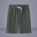 Casual cropped trousers in cotton-linen fabric with a drawstring waist, shown in a solid colour.