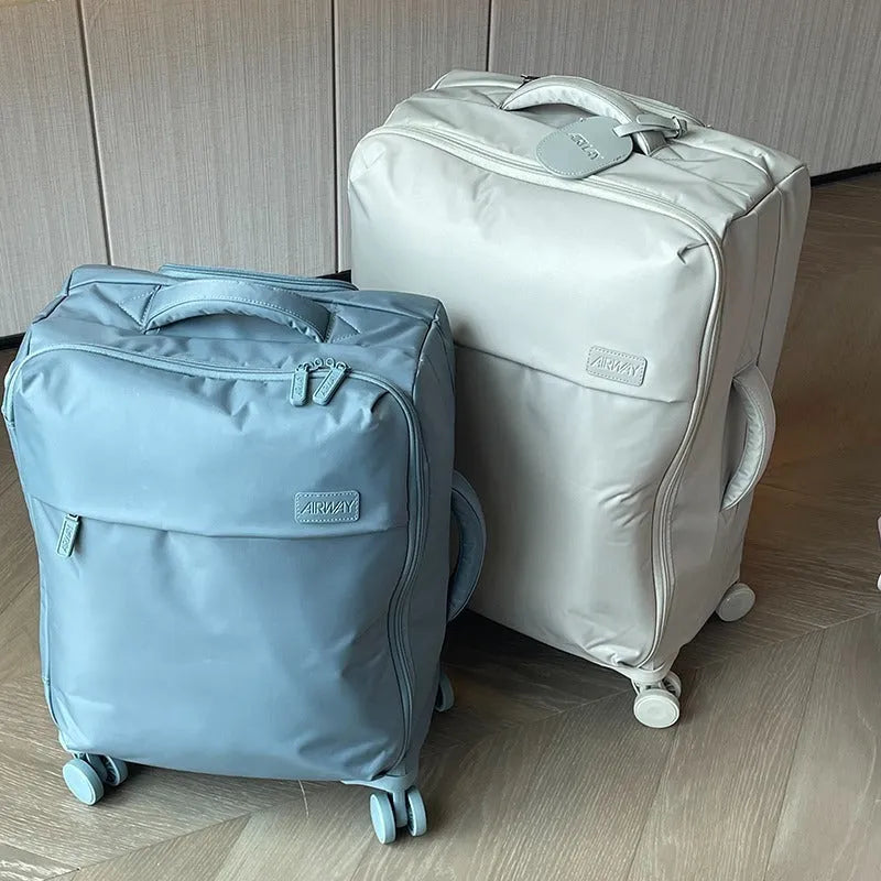 20-inch waterproof Oxford cloth suitcase in bluestone green colour with universal wheels and antibacterial lining