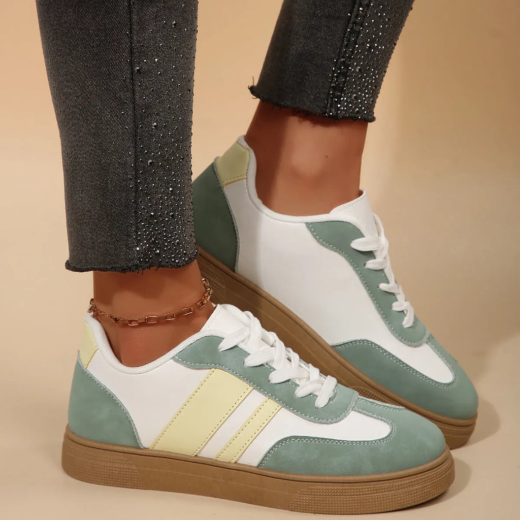 Green retro sports women's pumps with cross-strap design and round toe