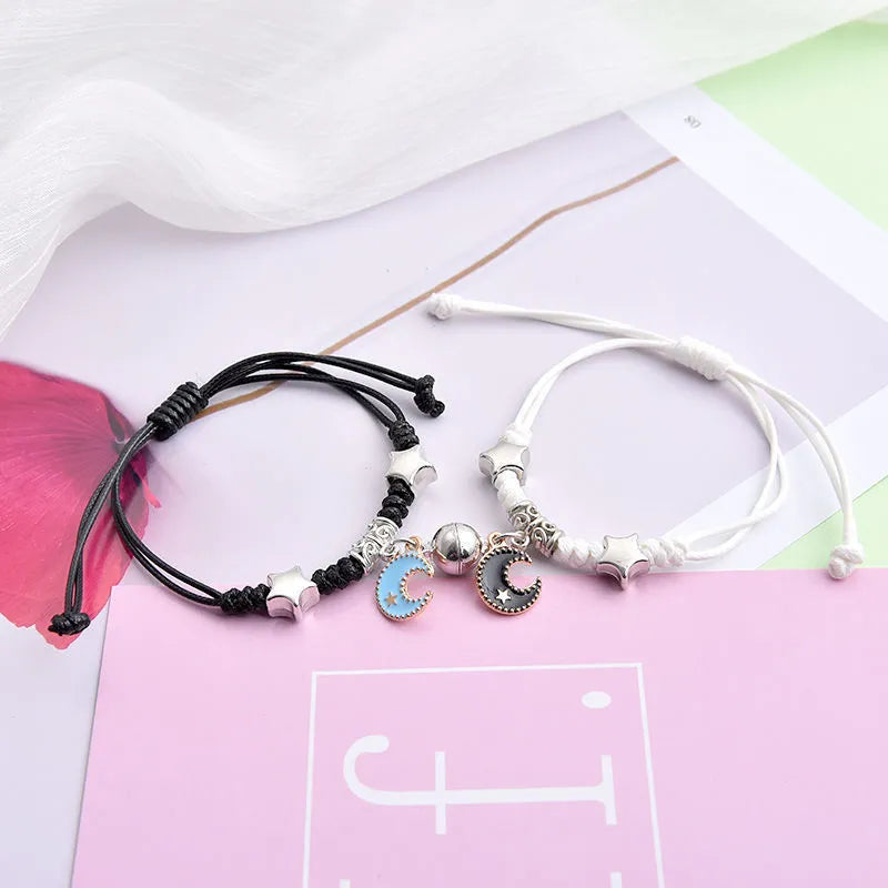Magnet couple bracelets with magnetic clasp in various styles including love lock and clover designs
