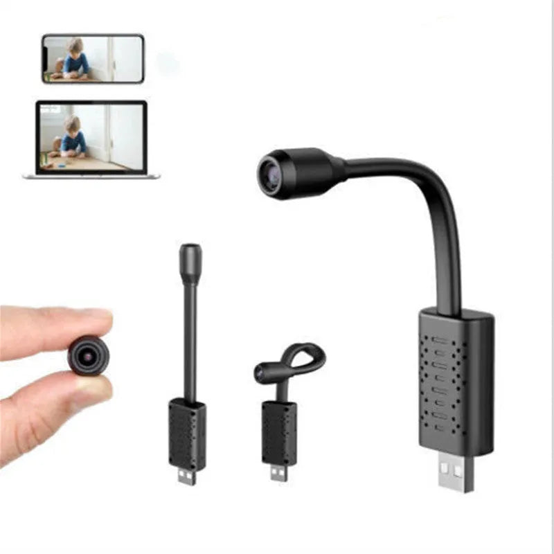 Slim black V380 wireless USB HD camera on a table showing its compact 158mm length design.