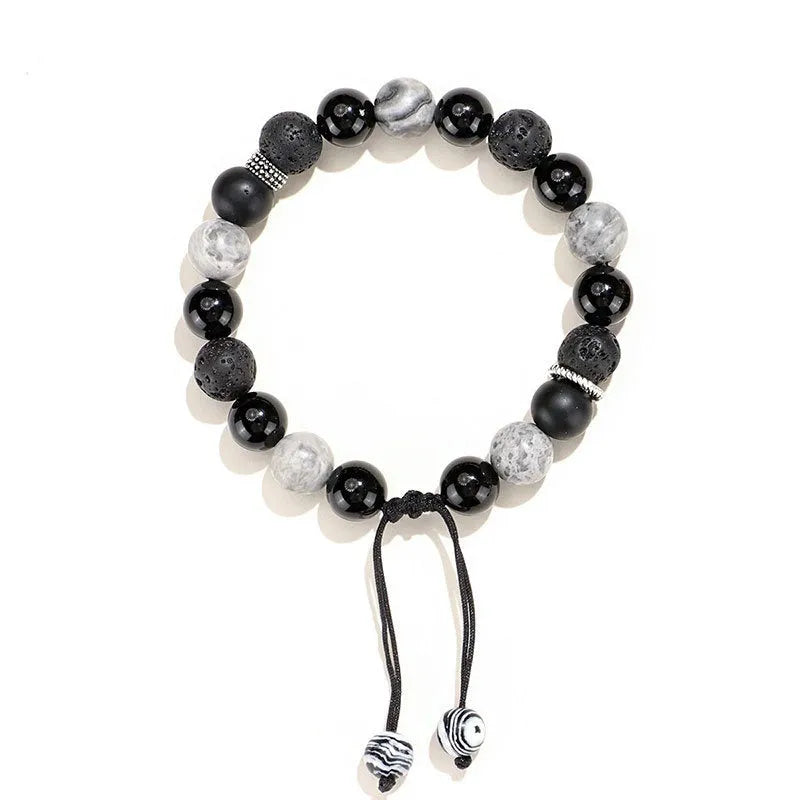 Black agate map stone volcanic bracelet showing diamond shape design and electroplated finish